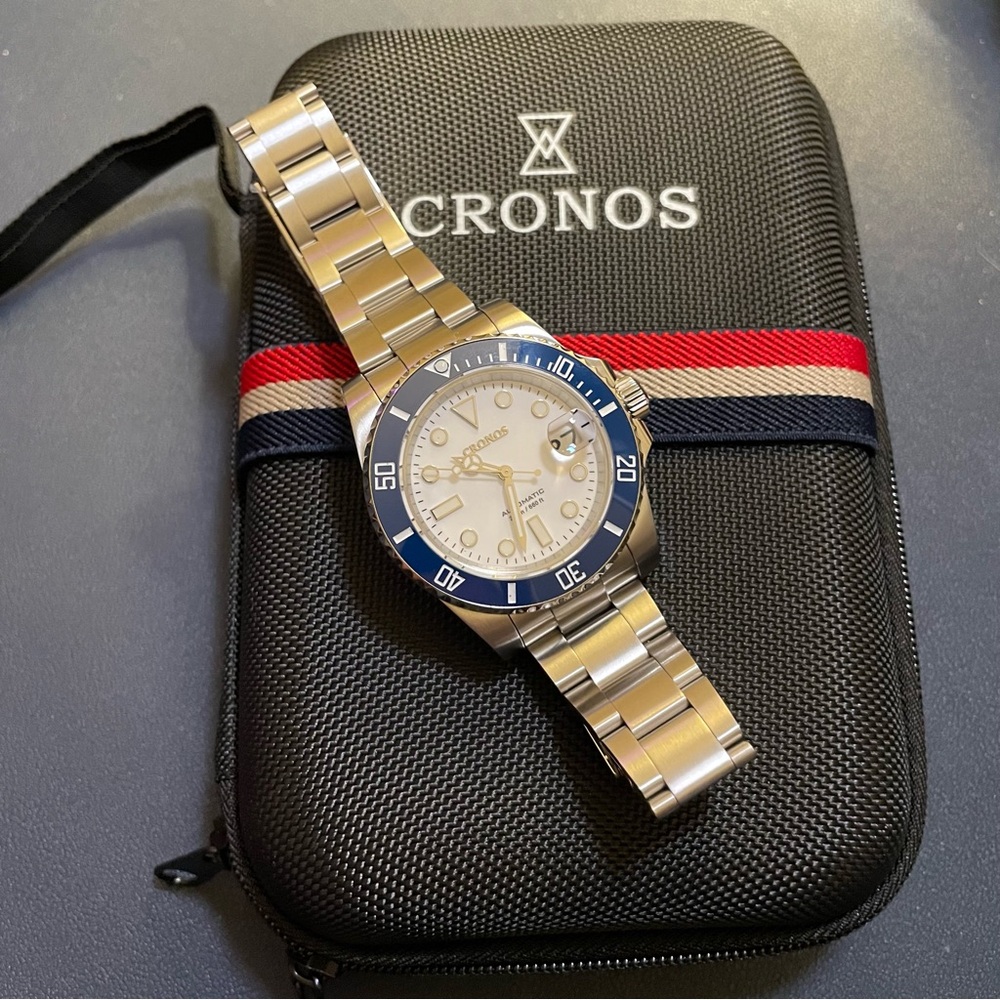 Men's Silver Watch with Blue Bezel and White Dial